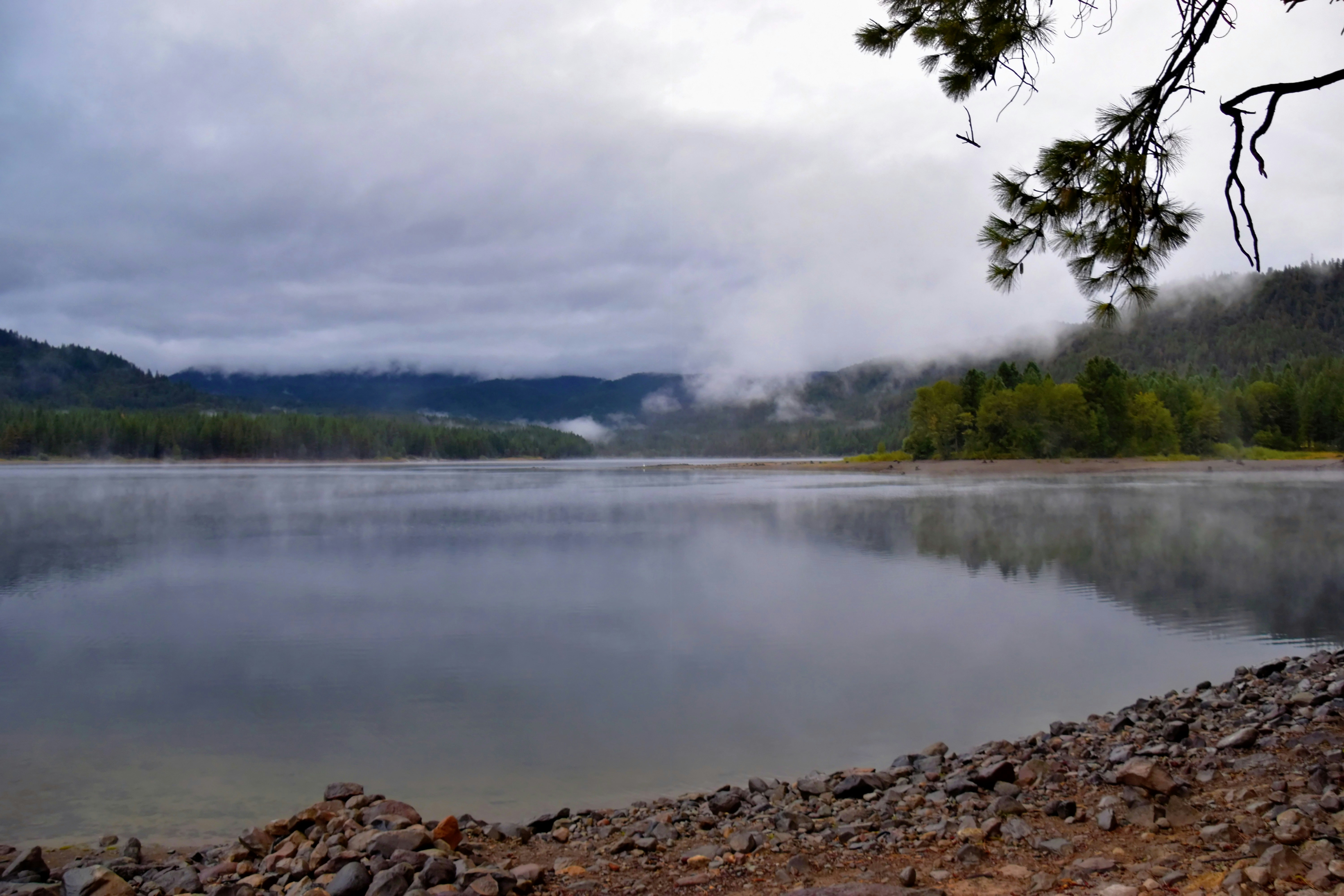 A lake with rocks and trees around it photo Free Lake siskiyou Image