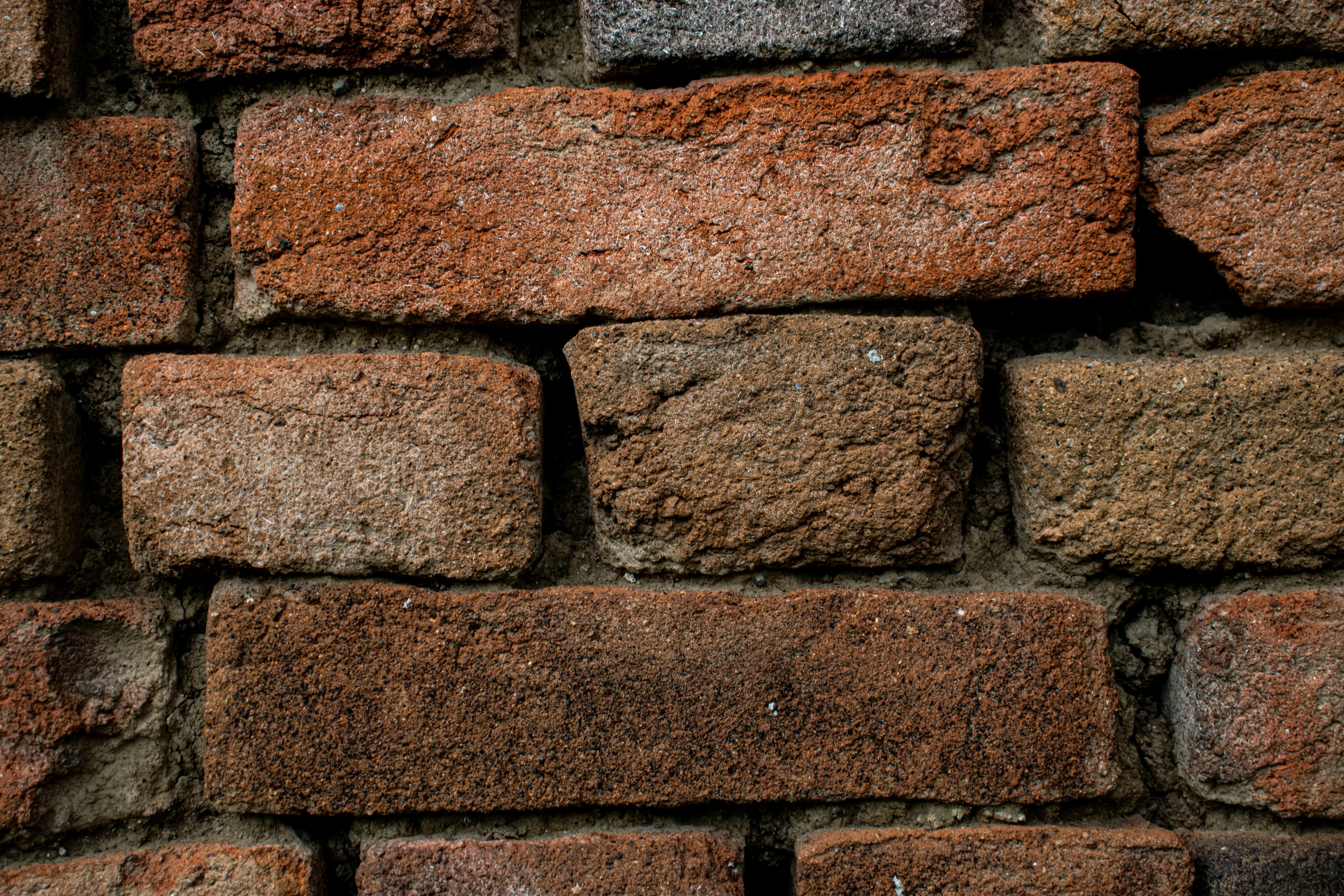 A close up of a brick wall made of bricks photo Free Brick Image on