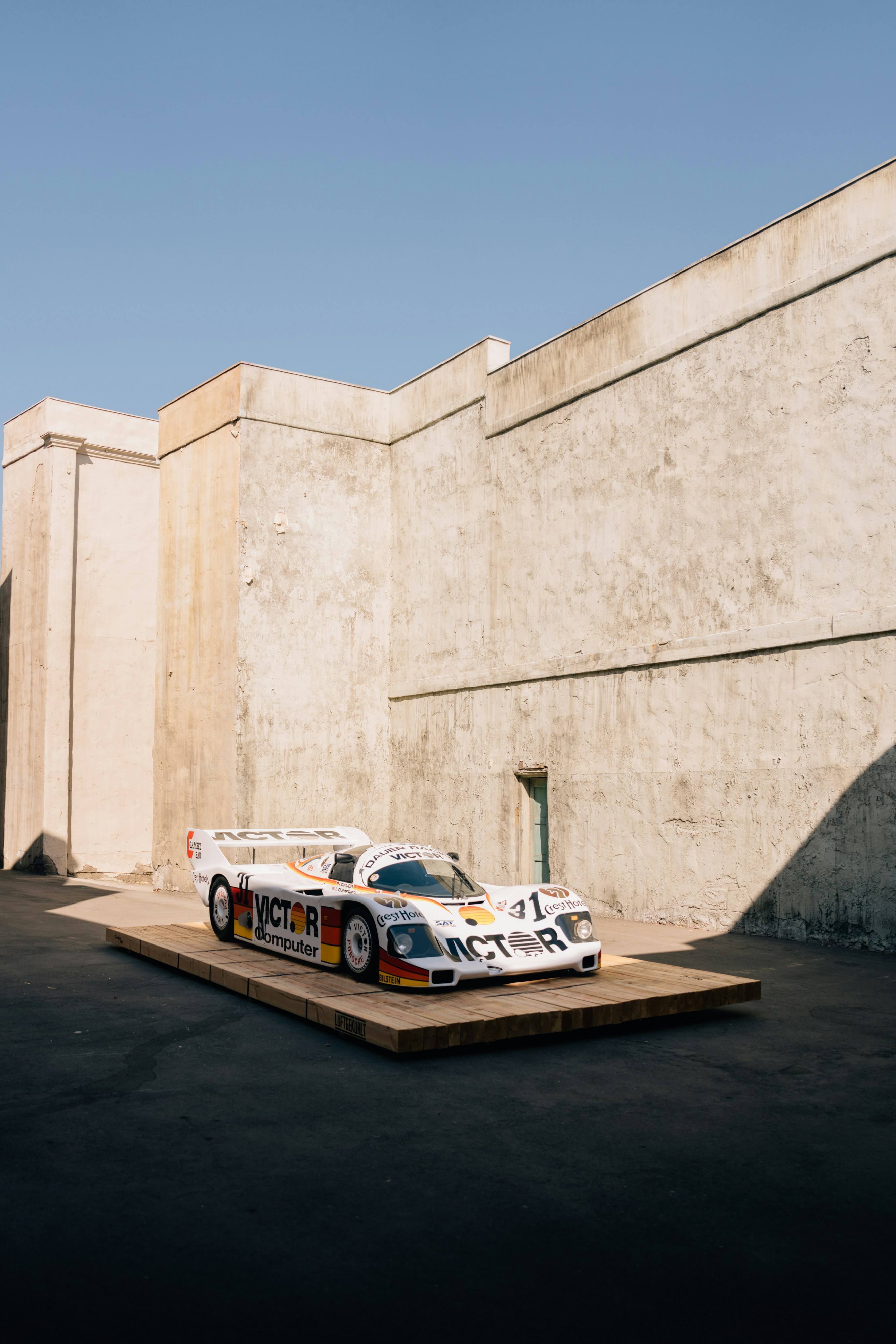 A race car sitting on top of a pallet photo Free Universal studios