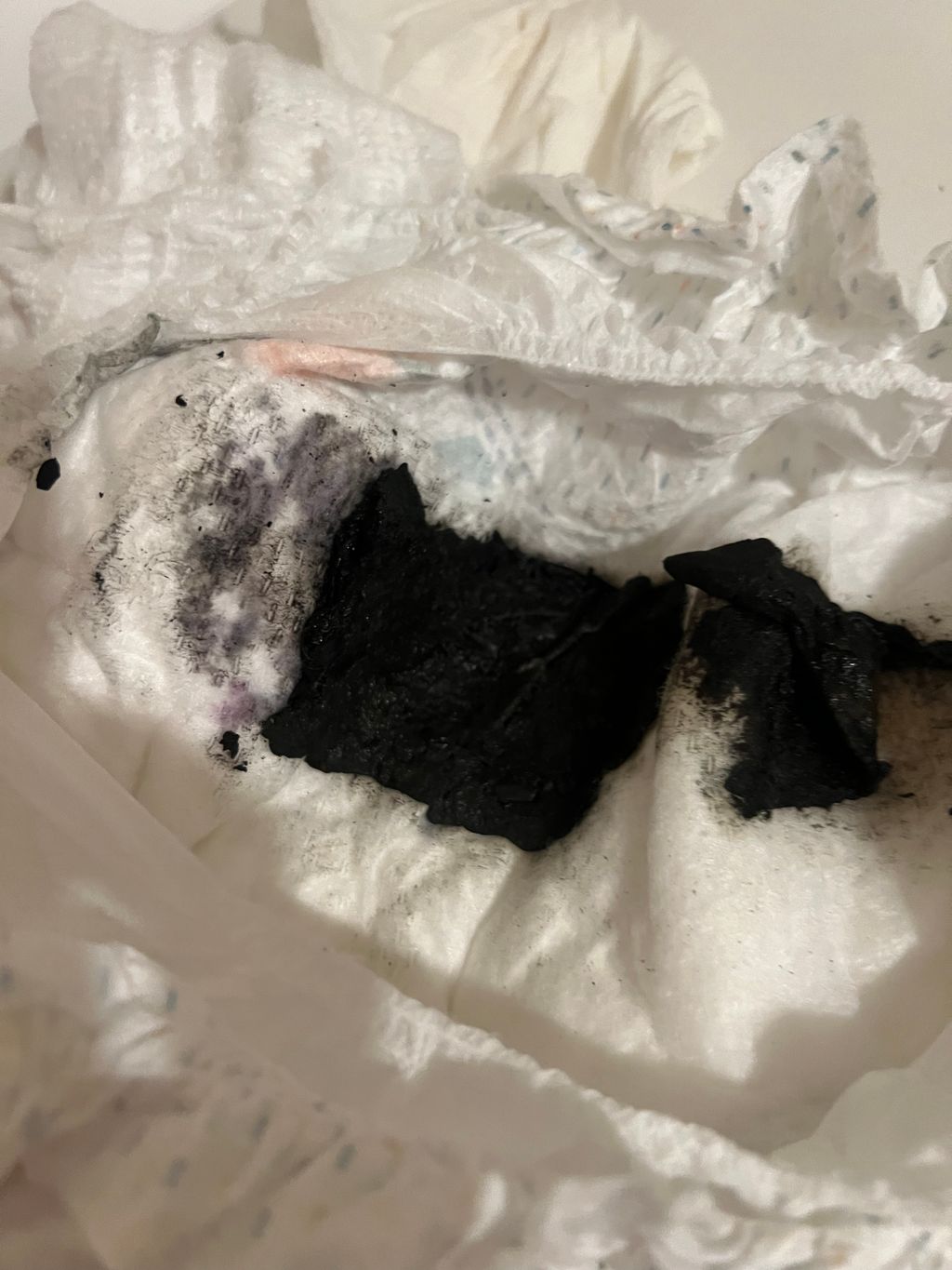 Can blueberries turn my babies poop completely black? Help! Photo