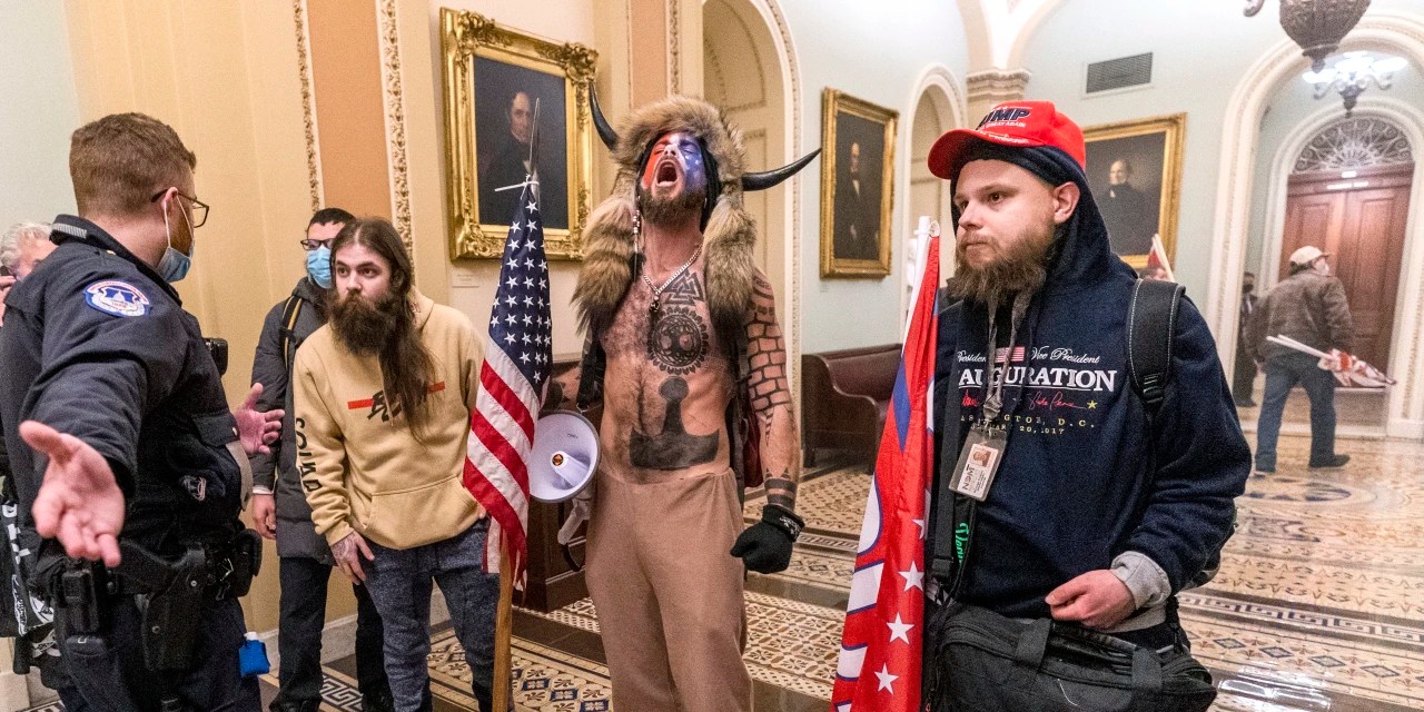 Capitol Riot Charges Florida Man Who Removed Pelosi Lectern, Man in Horned Costume and Man With