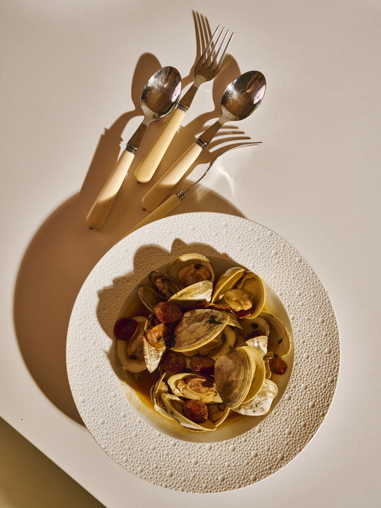 Clams in Chorizo Broth WSJ Recipes