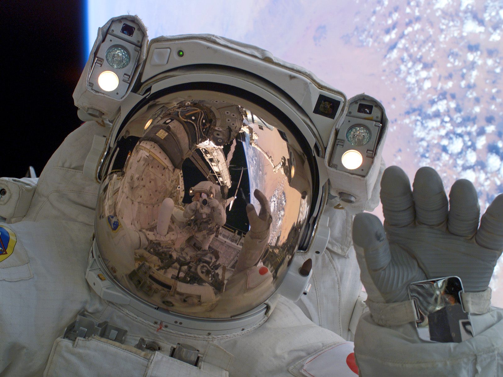 Stunning Astronaut Reflection HD Wallpaper from NASA