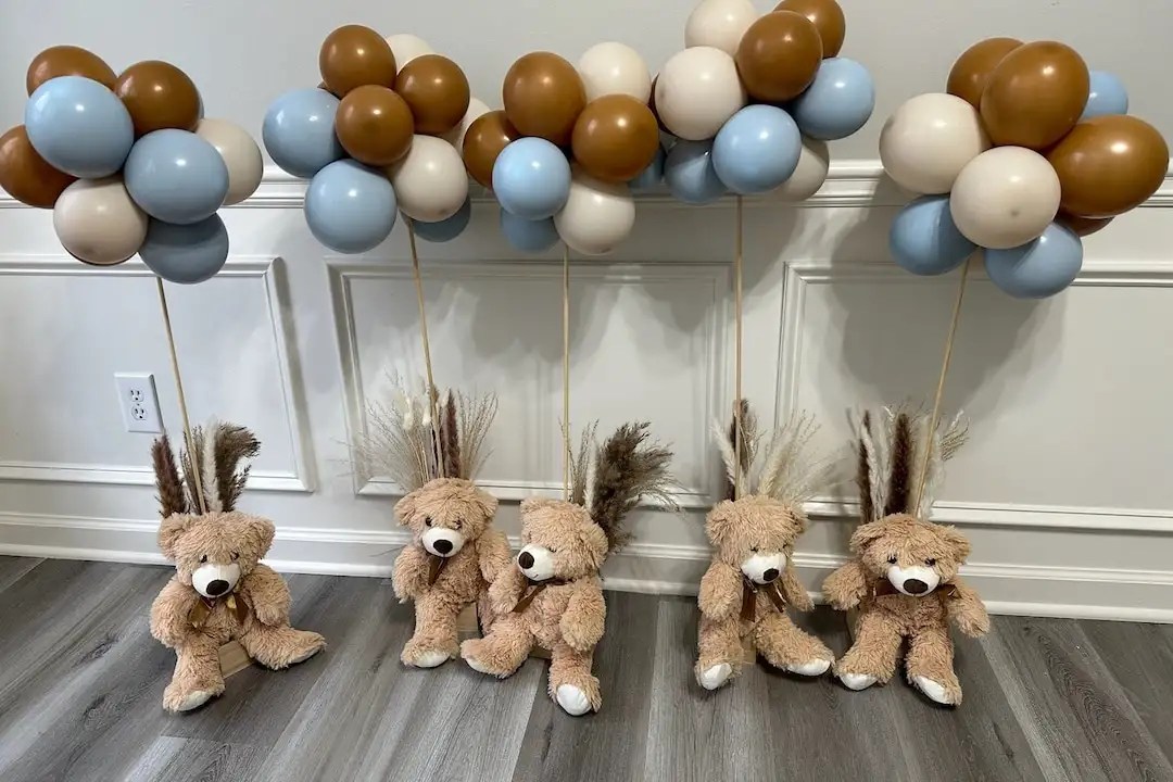 Teddy Bear Hanging From Balloons