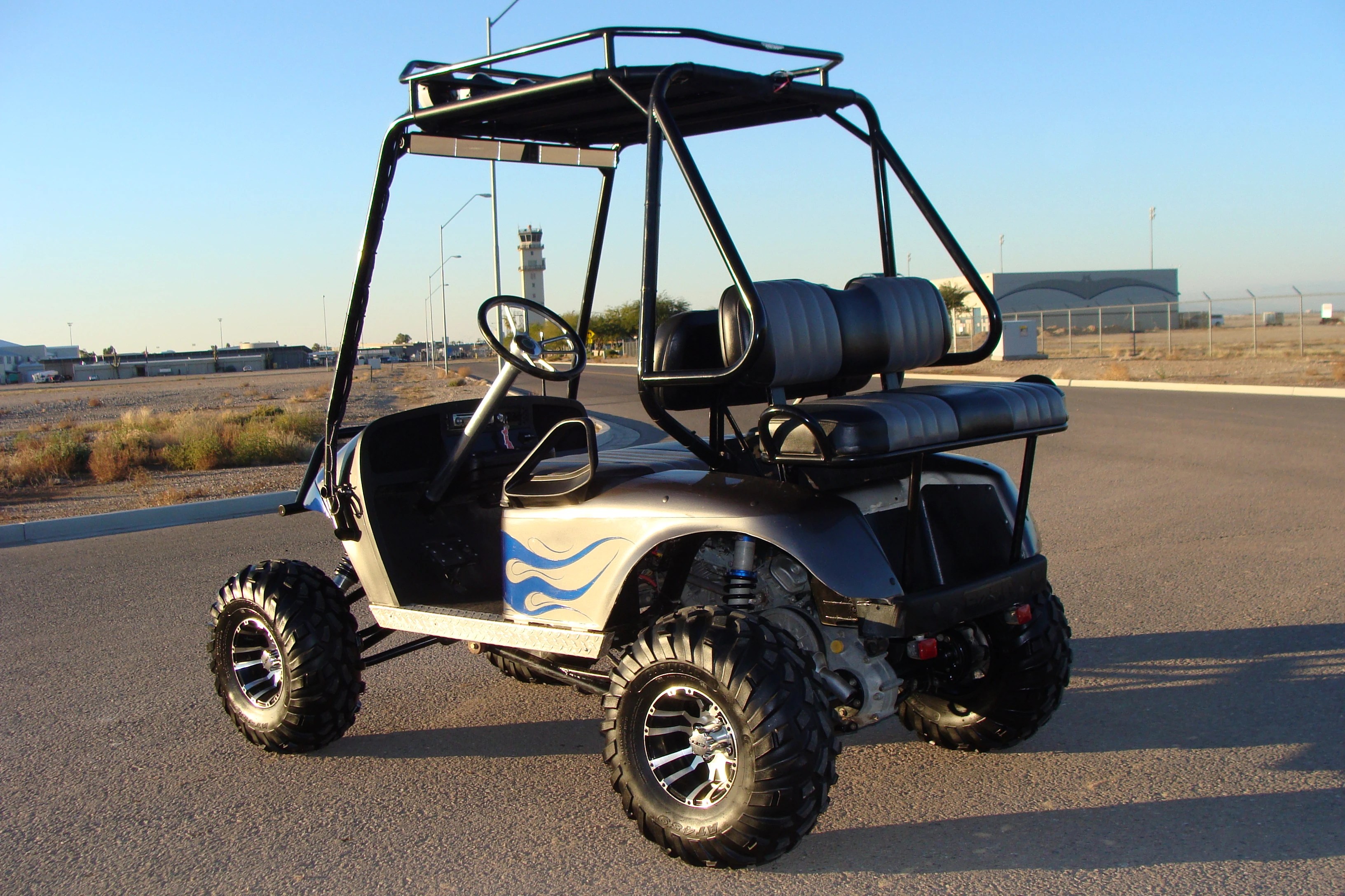 HONDA 24HP VTWIN POWERED LIFTED EZGO LONG TRAVEL GOLF CART, ROLL CAGE