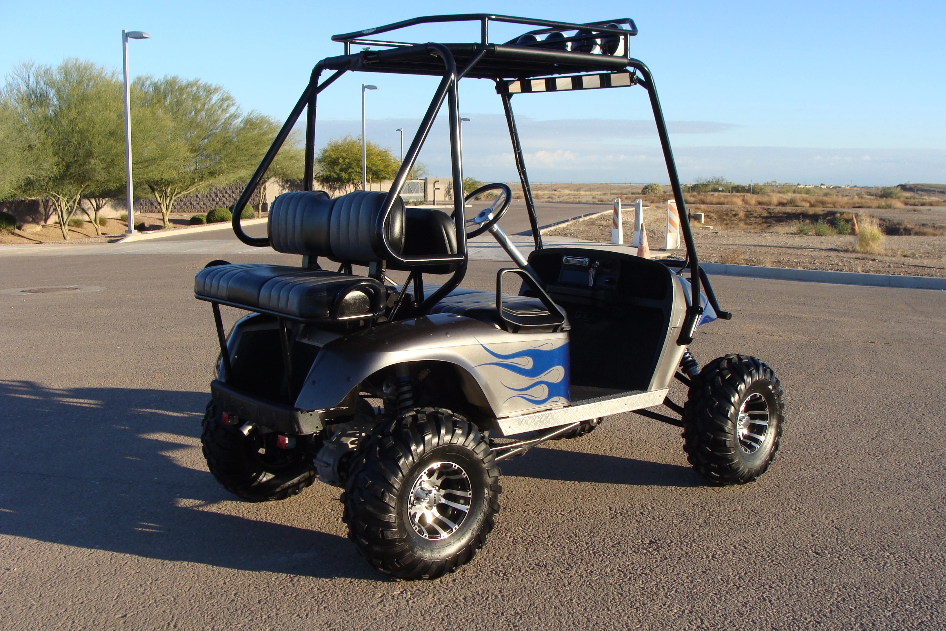 HONDA 24HP VTWIN POWERED LIFTED EZGO LONG TRAVEL GOLF CART, ROLL CAGE