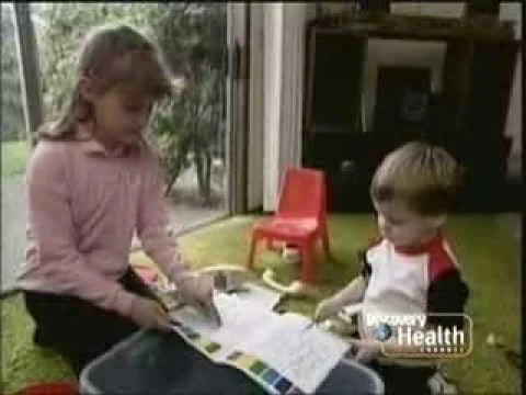 The episode of Rescue 911 where the 10-year old babysitter (born circa 1979) is watched by a creepy guy in a car while someone knocks on the front door.