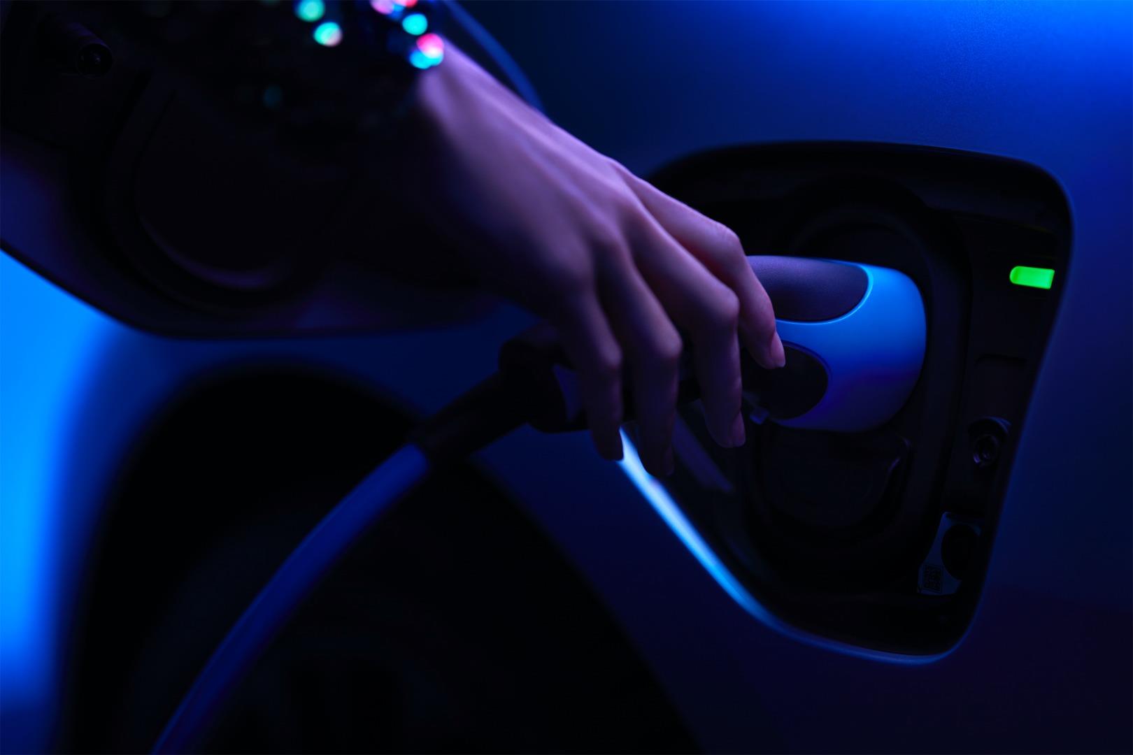 How does the resale value of an electric car compare to conventional