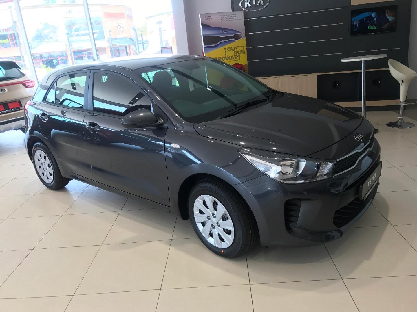 Replacing wiper blades on a Kia Rio Automotive News AutoTrader