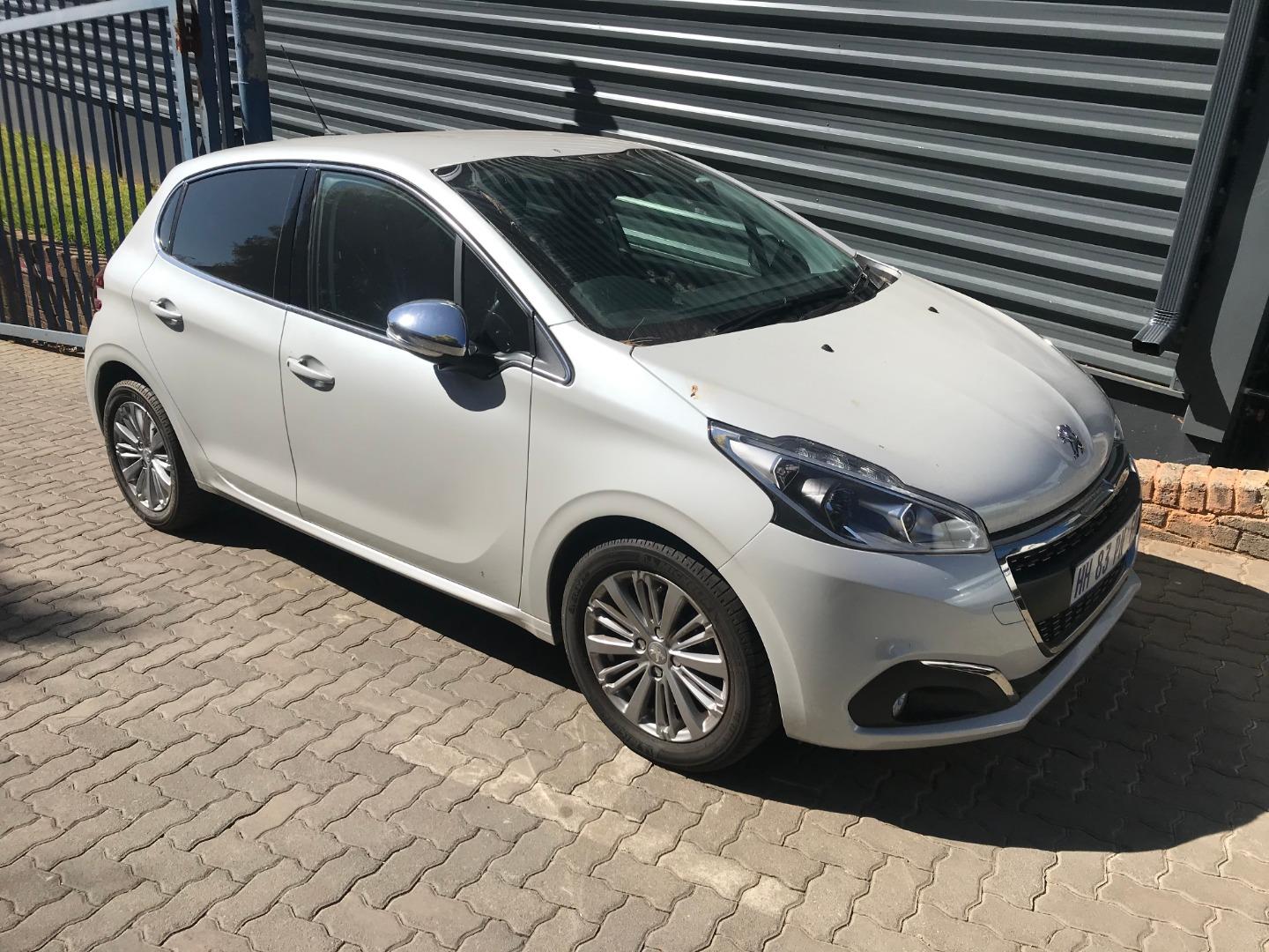 Changing wiper blades on a Peugeot 208 Car Ownership AutoTrader
