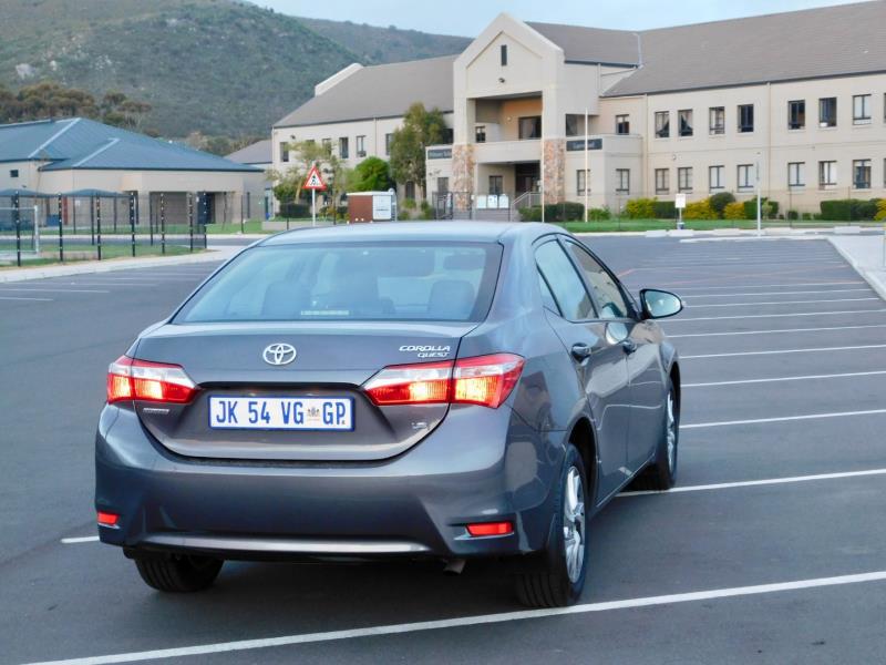 How to replace a taillight bulb on a Toyota Corolla Quest Car