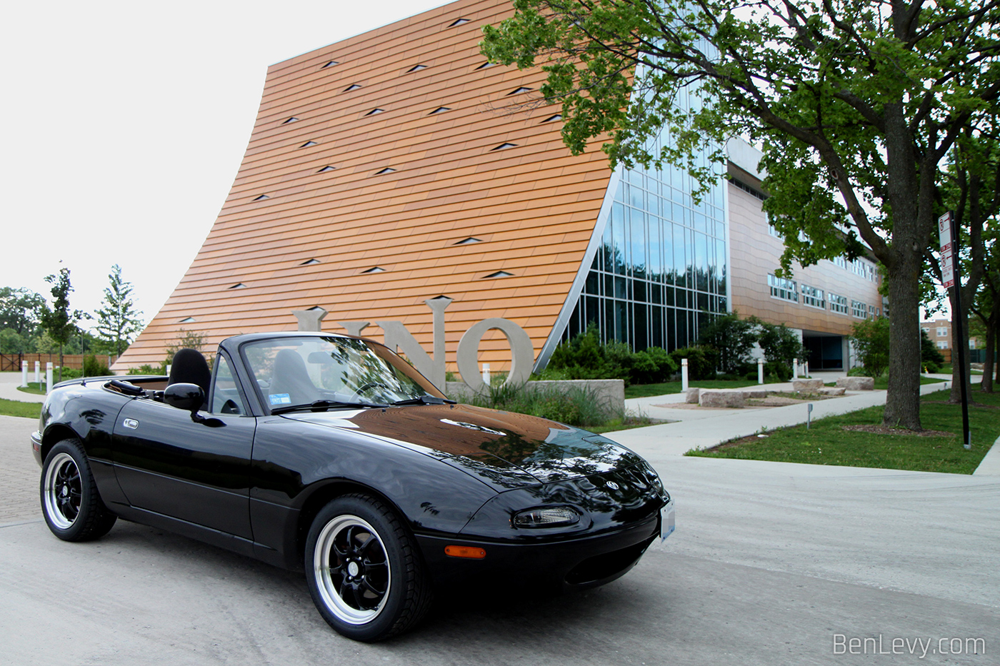 NA Mazda Miata with black Enkei Classic JSpeed wheels