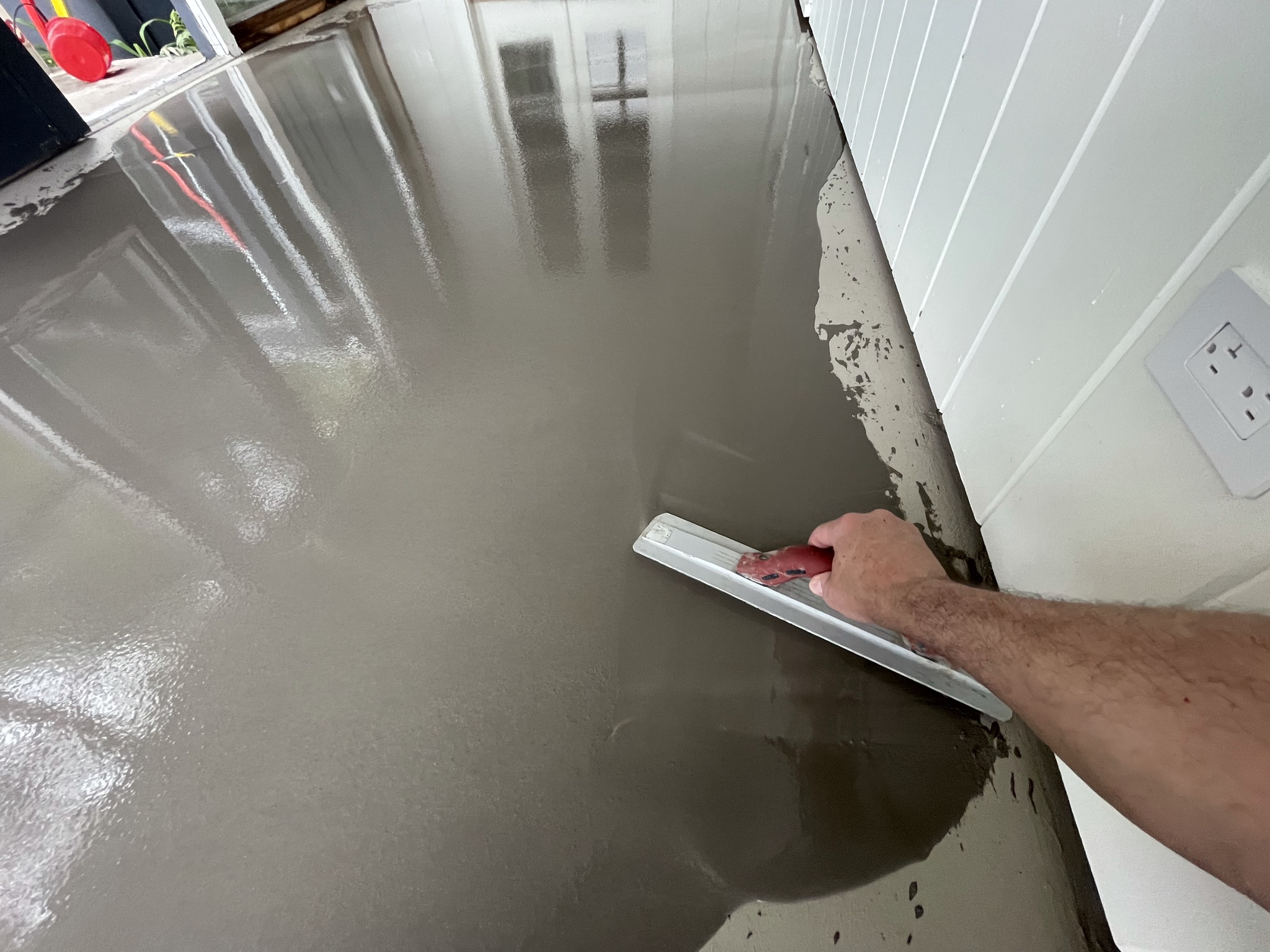 SelfLeveling Concrete Underlayment Placement Before Tiling Cabin DIY