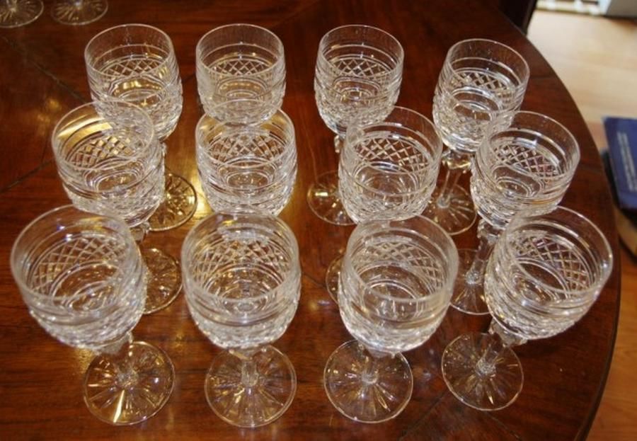 Twelve Waterford red wine glasses Lismore pattern, small chip