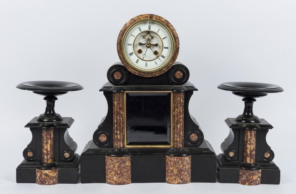 An antique French drumhead mantle clock in Belgium black slate