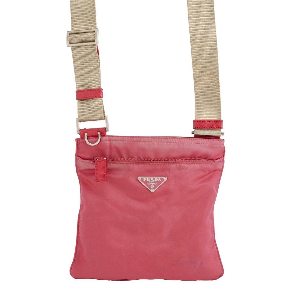 Prada, crossbody bag, styled in pink nylon with silver tone… Handbags