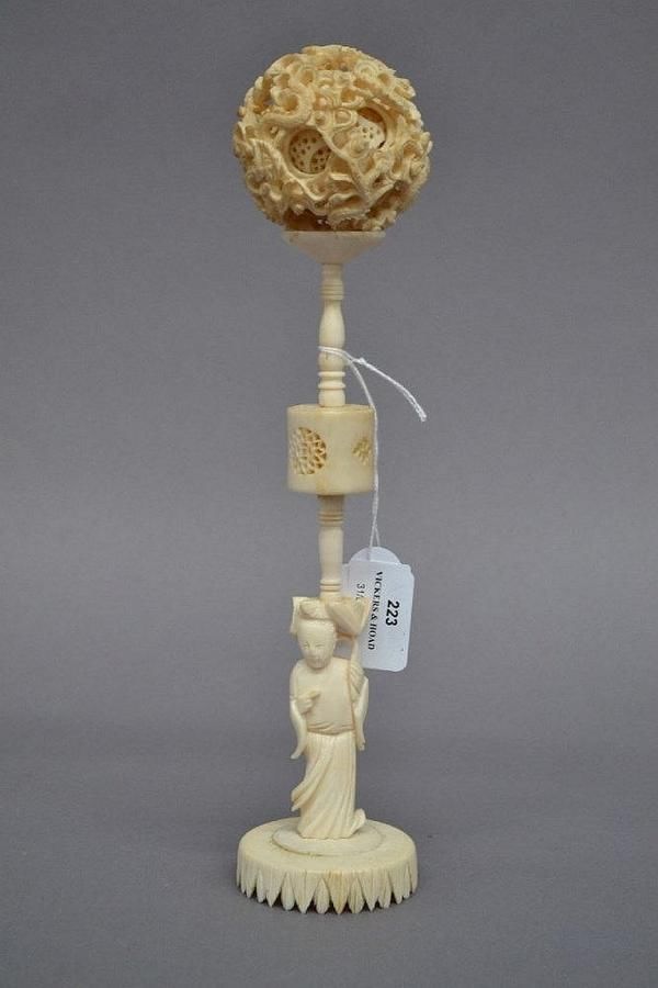 Chinese carved ivory puzzle ball on stand, approx 28.5 cm high Ivory