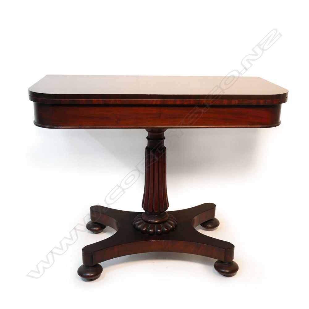 A William IV mahogany fold over top tea table, the rectangular