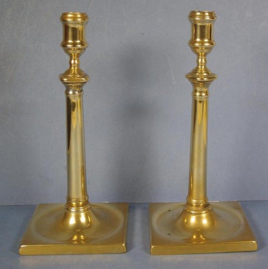 Pair of early III brass candlesticks, 27 cm high Candelabra