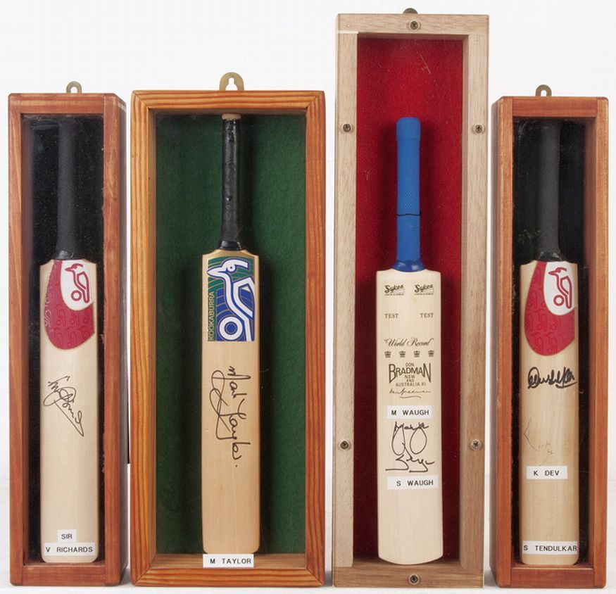 Signed Miniature Bats, in four small display cases, noted Viv