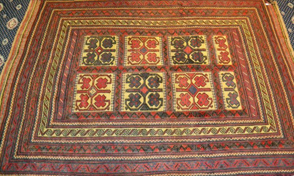 An antique Afghanistan tribal Kazak style Kilim rug, with a… Rugs