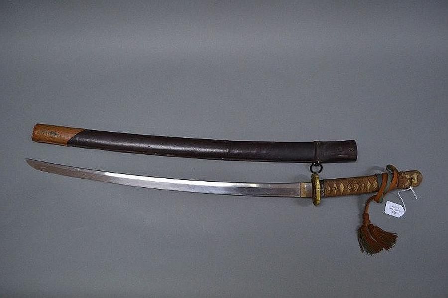 Antique Japanese Samurai sword with later World War II leather… Edged
