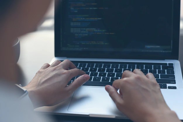 Premium Photo Computer programmer software engineer coding javascript