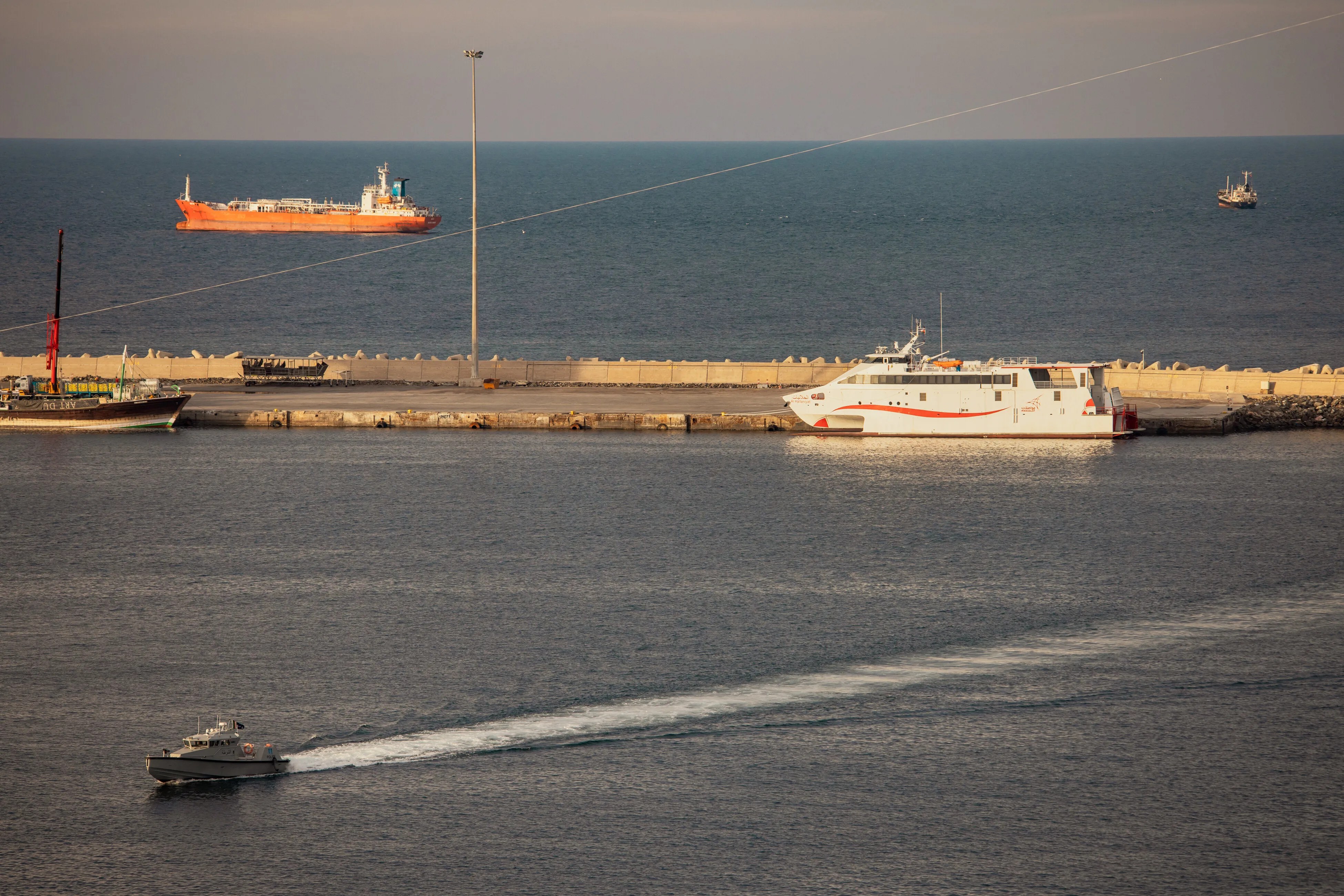 U.S. Intelligence Warns Iran Unlikely To Ease Hormuz Strait Chokehold Soon, Sources Say