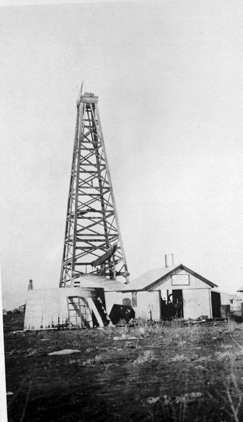 Oil well pump and derrick Kansas Memory
