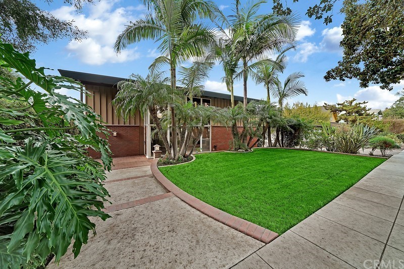 A Paul Tay MidCentury Modern home in Alamitos Heights is offered at 1