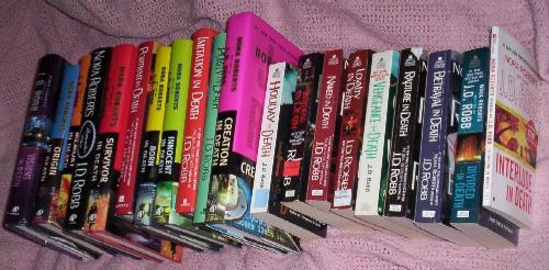 I have almost all of the "In Death" series by J.D. Robb AKA Nora