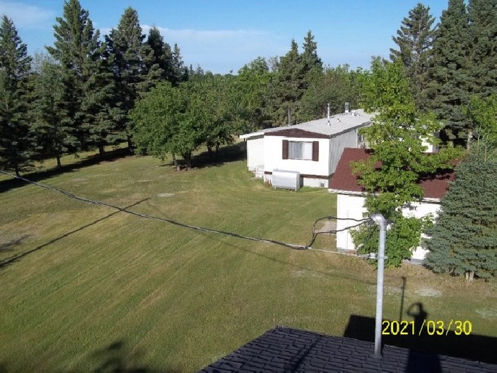 ACREAGE AND HOME WITH LARGE SHOP in Saskatoon,SK Land for Sale