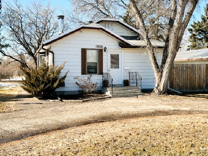 Unique .48 acre Parcel, right in Town For Sale in Red Deer,AB Houses