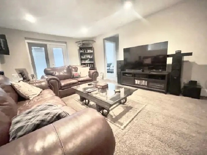 ONE LOOK WILL DO walkout lower level w/ pond view in Lethbridge,AB