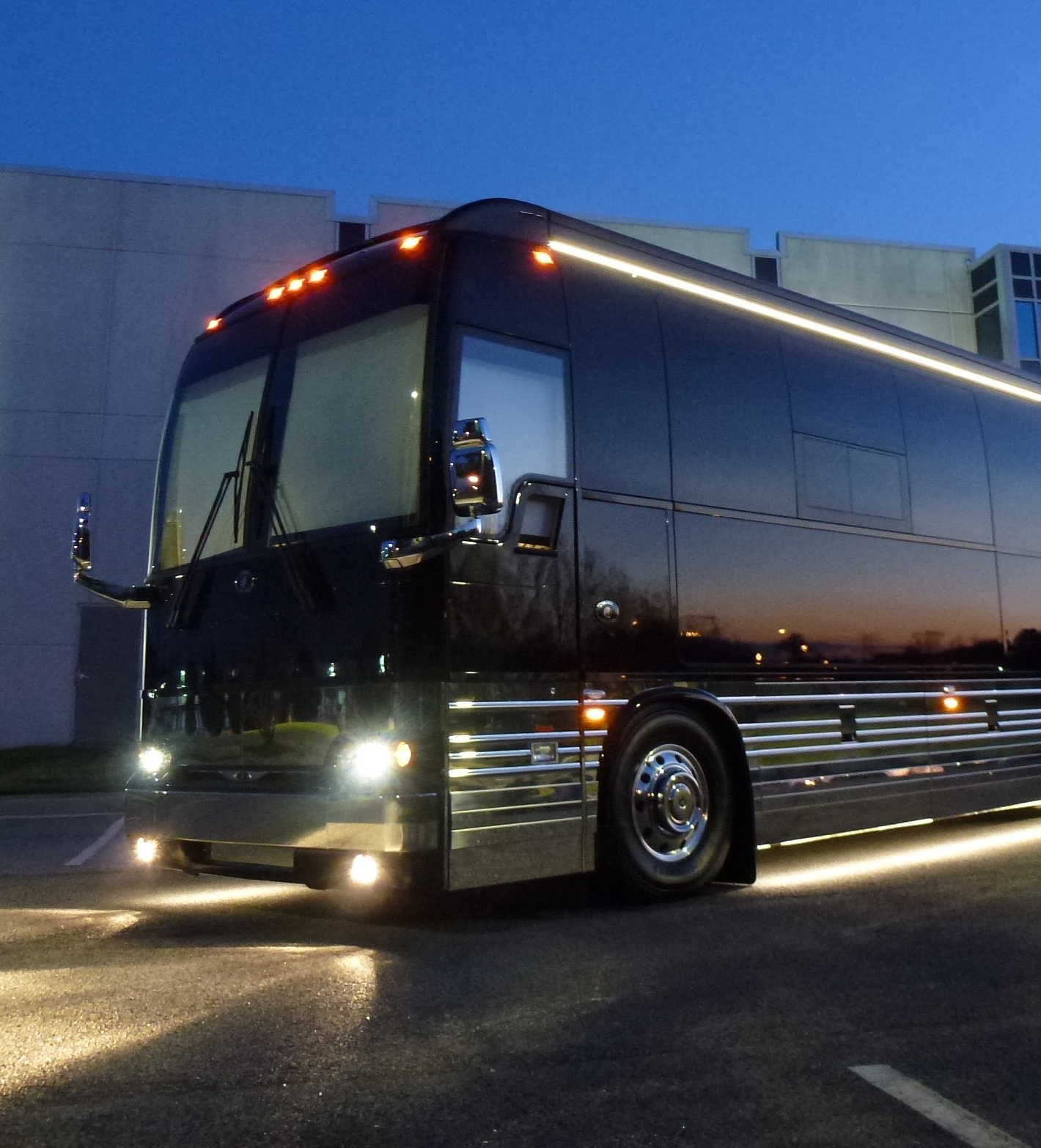 56 PASSENGER MOTOR COACH Hourly Charter Zero Limo Luxury