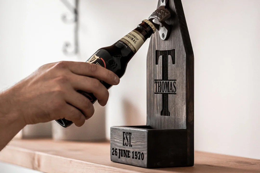 Wall mount bottle opener with cap catcher
