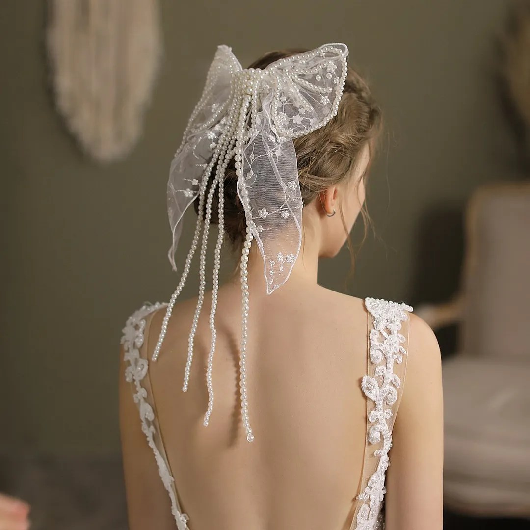 Beautiful lace bow bridal headdress veil