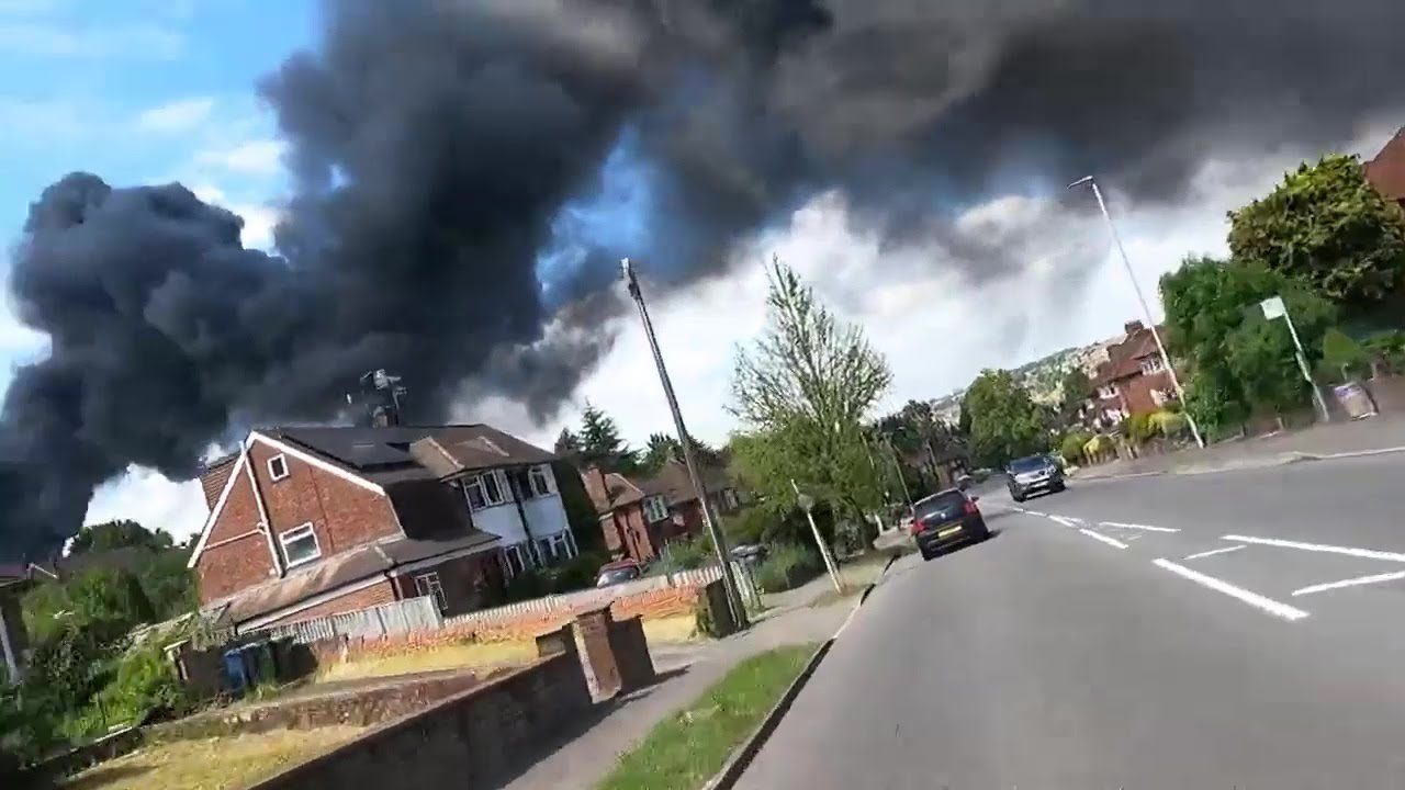 Footage shows billowing black smoke from warehouse fire after explosion