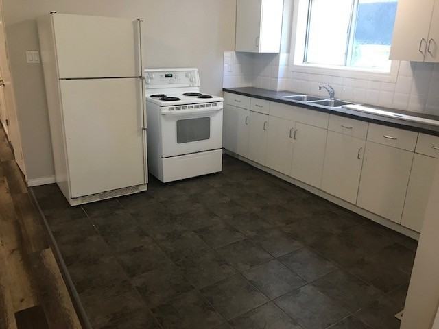 7403 36 Avenue Northwest B Apartments in Bowness, Calgary, AB T3B 1V2