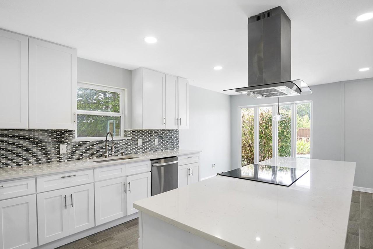 Lavishly remodeled Plano home with fenced yard & pool Apartments in