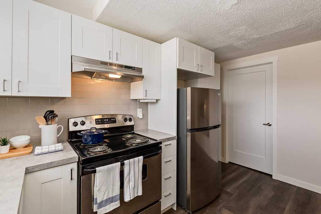 Greenland Townhomes Apartments 401 Grier Ave Ne, Calgary, AB T2K 5S7
