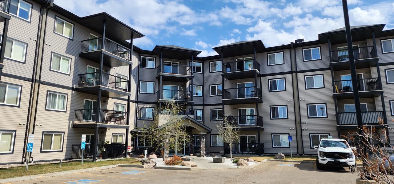 Spacious & Bright 2 bed 2 bath ground floor condo*Underground Stall*Gym