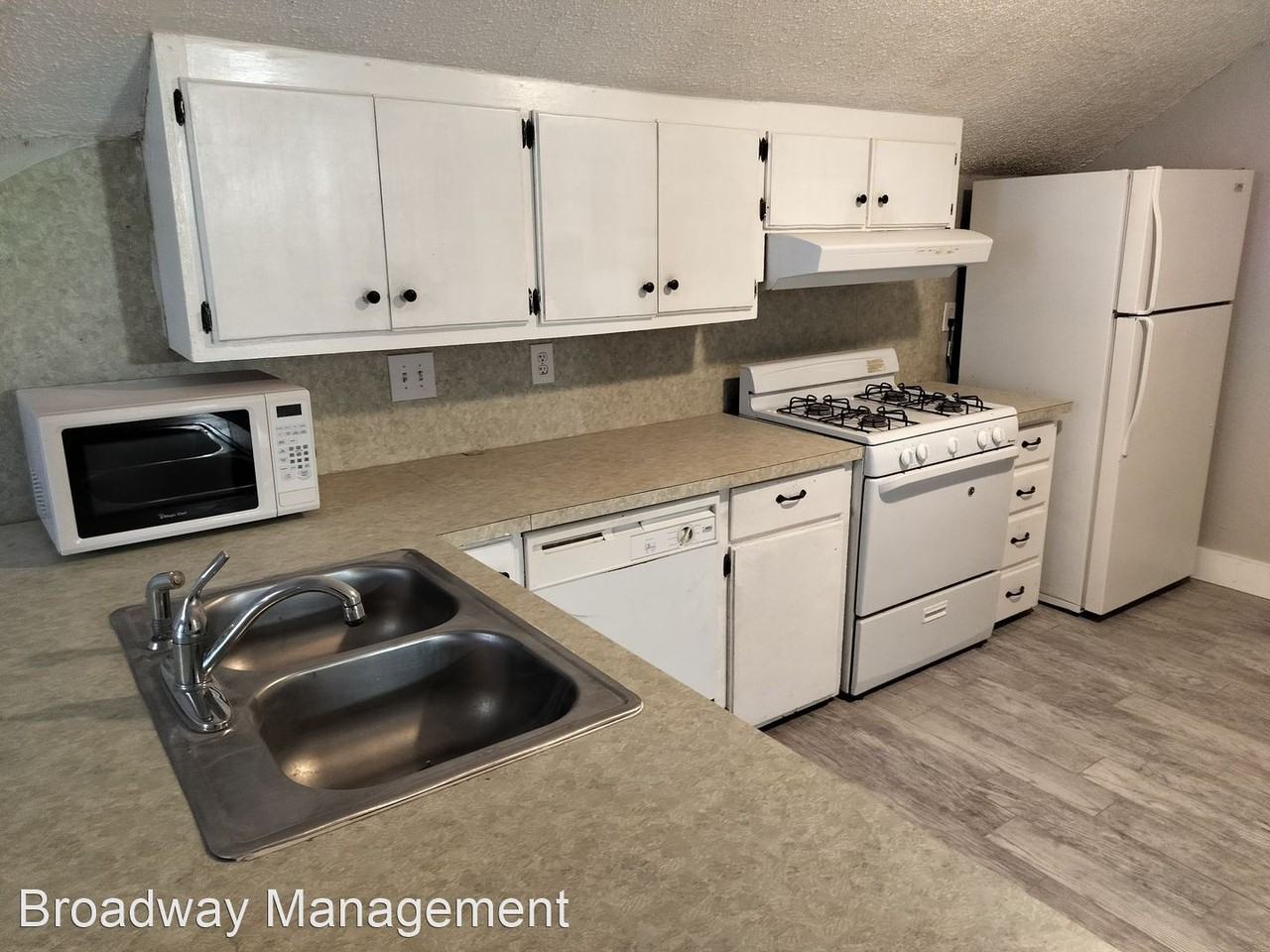 Bronchos Apartments in Edmond, OK next to UCO campus 320 E Edwards St