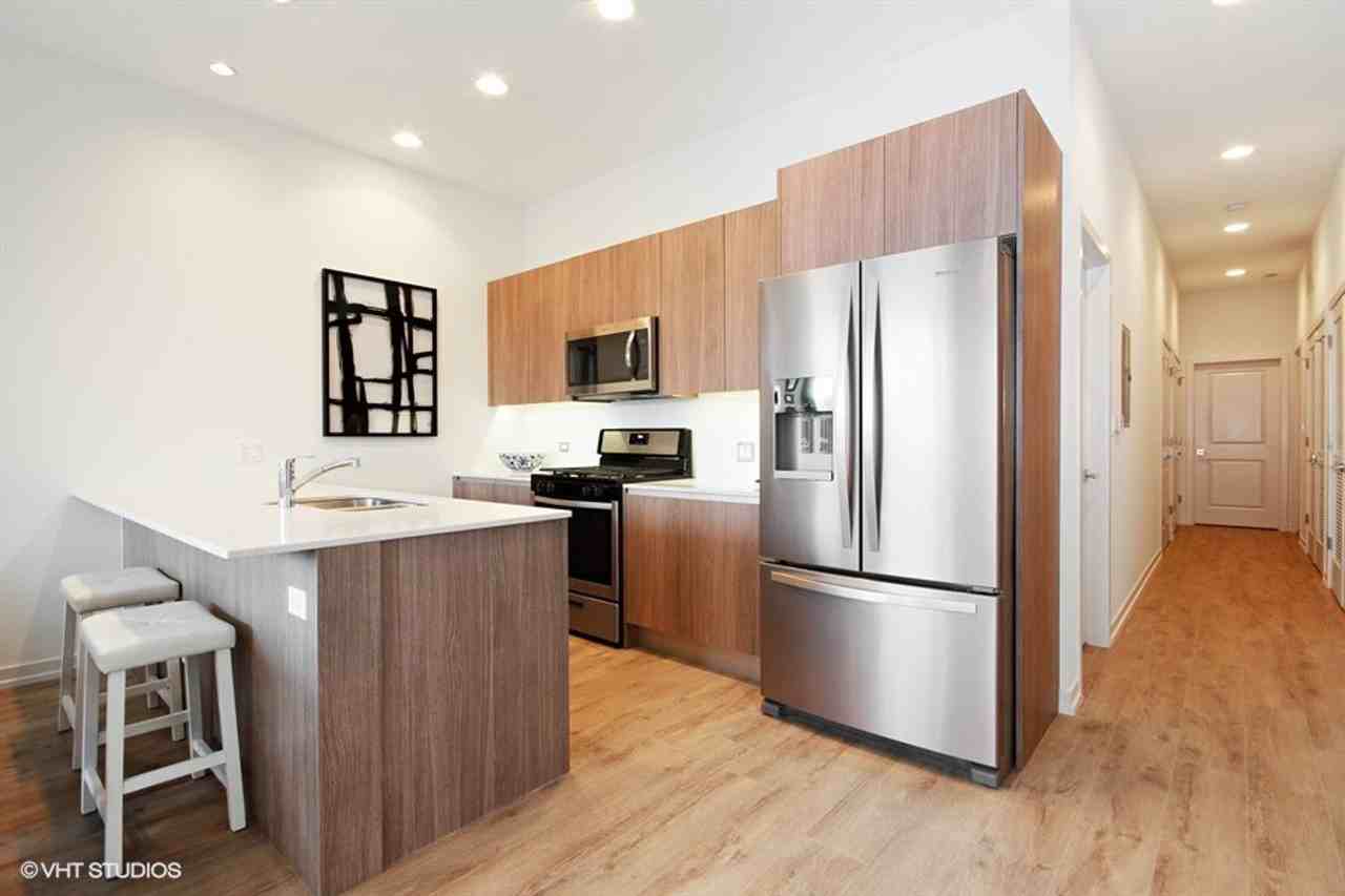 STUNNING PORTAGE PARK 2 BED 2 BA WITH CONDO QUALITY FINISHES Apartments
