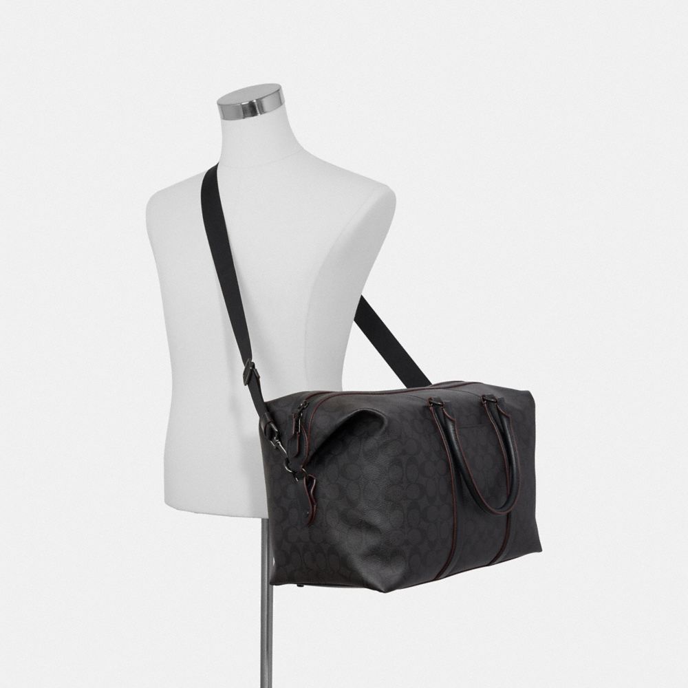 TREKKER BAG IN SIGNATURE CANVAS COACH® Outlet