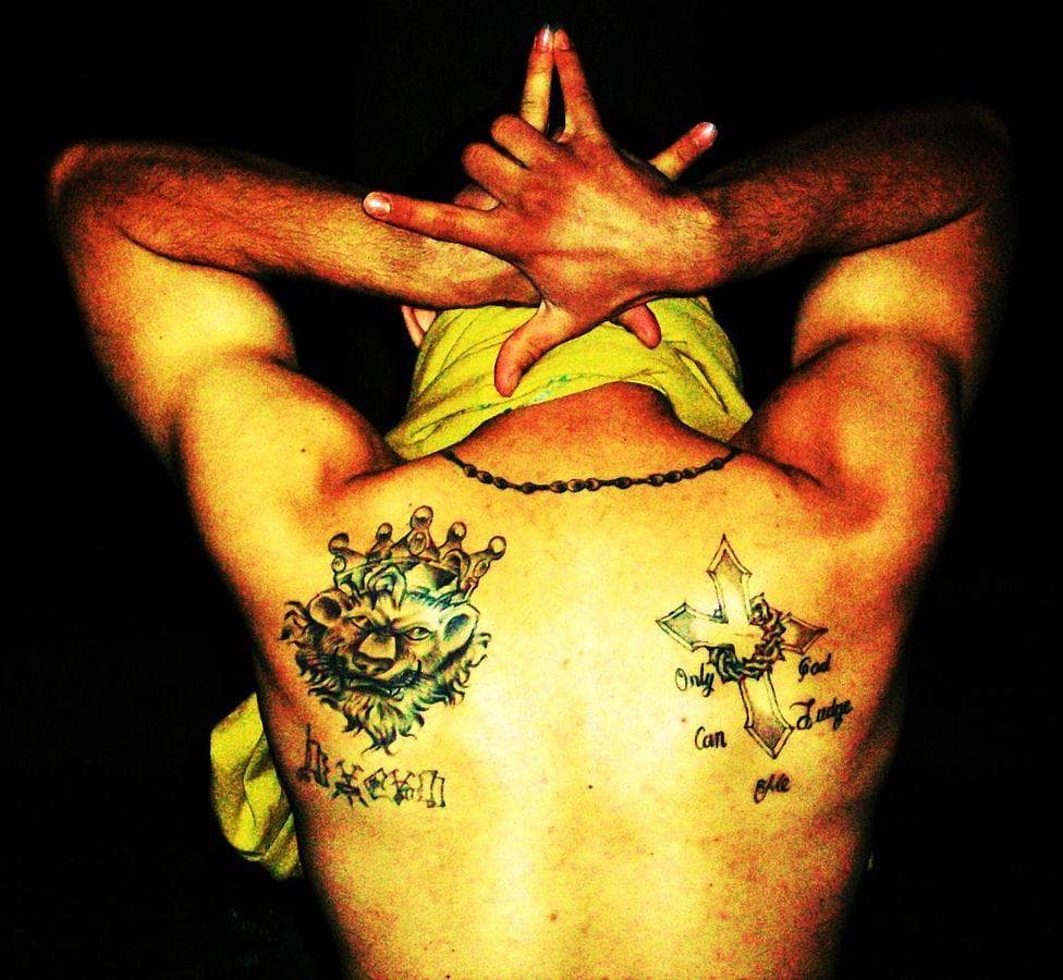 14 Common Cartel Tattoos And The Meanings Behind Them 692_x_750_jpg