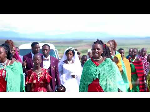 HARUSI YA JEREMIAH NA MAYAN YAVUNJA REKODI GILAI NZIMA WAZAZI NA KANISA WAJIVUNIA JEREMIAH HARUSI YA JEREMIAH NA MAYAN YAVUNJA REKODI GILAI NZIMA WAZAZI NA KANISA WAJIVUNIA JEREMIAH