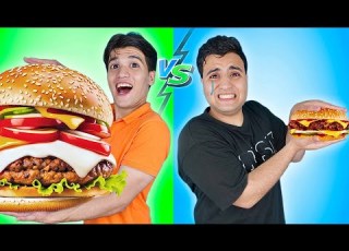 تحدي العملاق ضد الصغير مع العقاب كلنا اكبر طعام في العالم