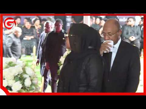 PRESIDENT MWINYI AND HIS WIFE PAID HONOR TO THE COFFIN CONTAINING LUKUVI S BODY IN DAR