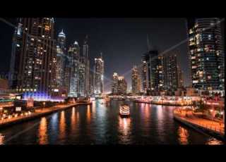 DUBAI UAE SEPTEMBER 21 2014 Timelapse View Of Dubai Marina Skyscrapers With Yachts And Boats